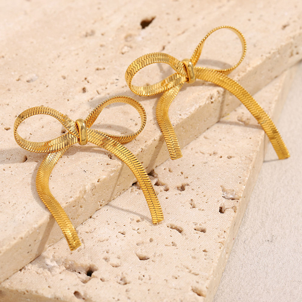The Golden Ribbon Bow Studs