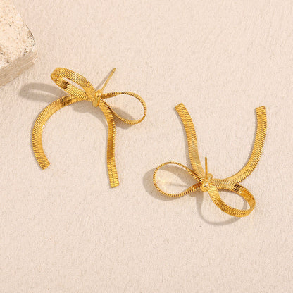 The Golden Ribbon Bow Studs