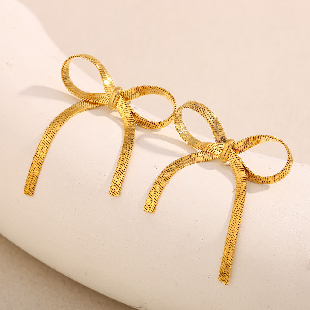The Golden Ribbon Bow Studs