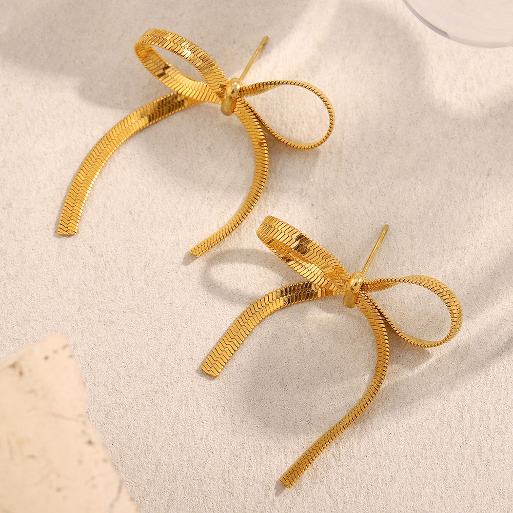 The Golden Ribbon Bow Studs