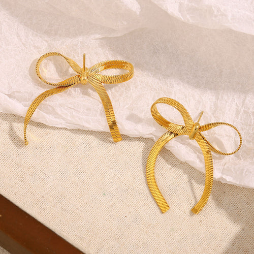 The Golden Ribbon Bow Studs